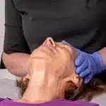 Fiona With gloves on ready to perform microneedling