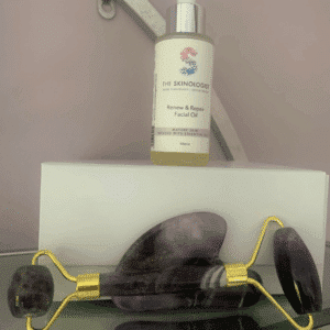 The Skinologist Renew and repair facial oil and Amethyst Gua Sha and Roller Set.